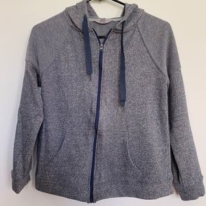 Athletic criss cross zip up
